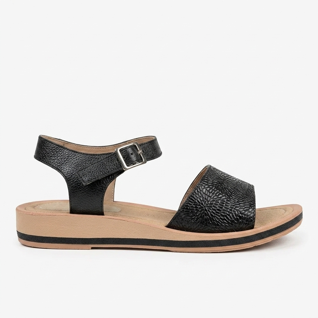 SANDALIA PLANA EN CUERO COLOR NEGRO DISTINTIVO
